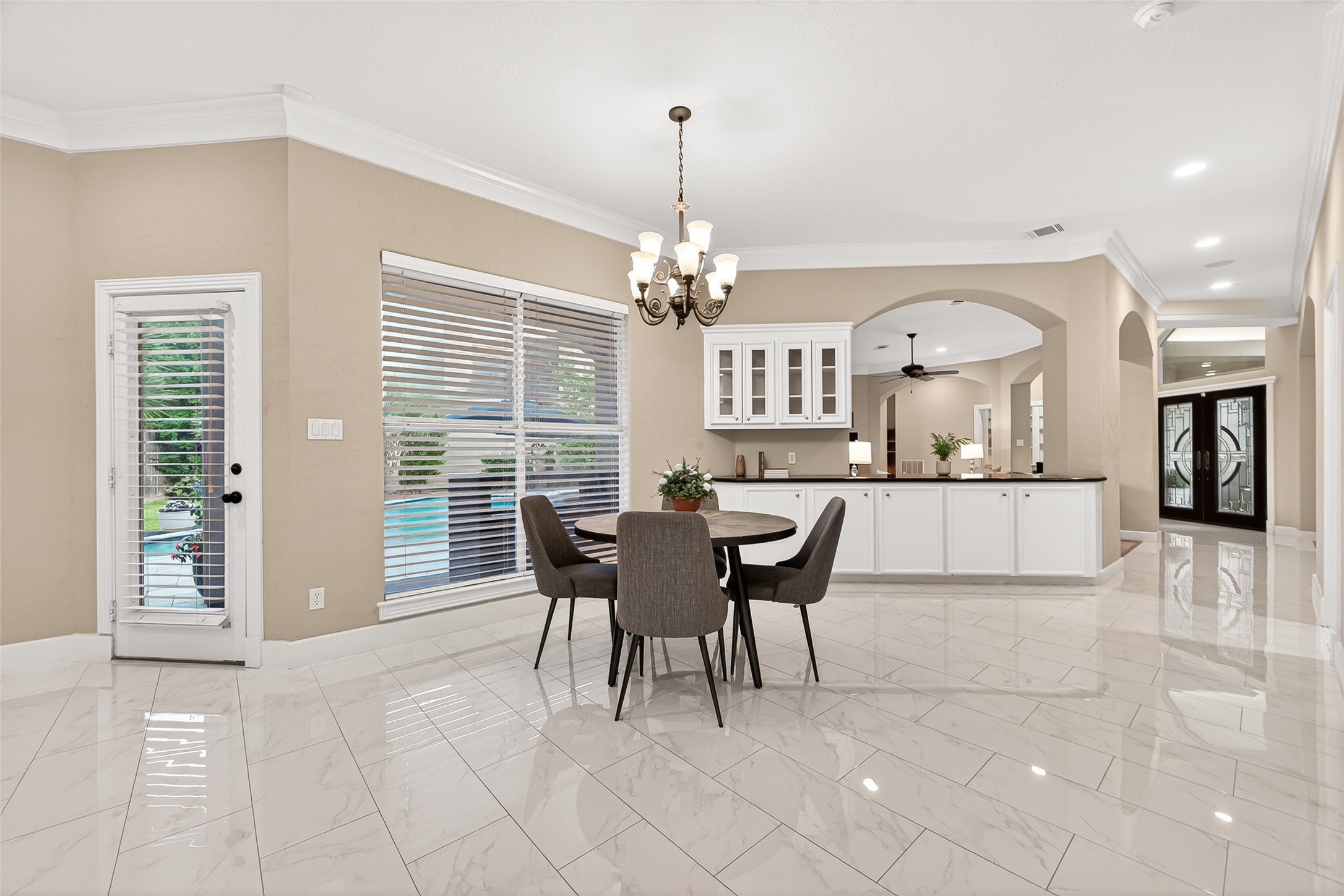 22 Stonegate Park Court Spring, TX 77379 - Photo 9 of 49 Alternate view of the breakfast room with access to the backyard.