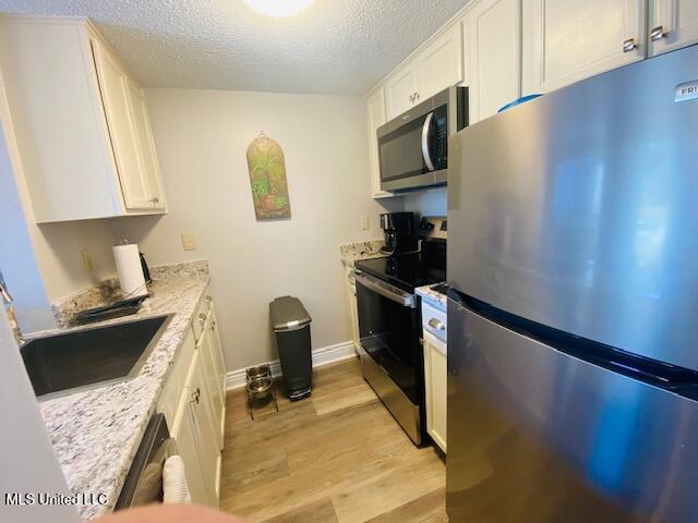 113 Molokai, Unit D Diamondhead, MS 39525 - Photo 8 of 21 IMG_5489