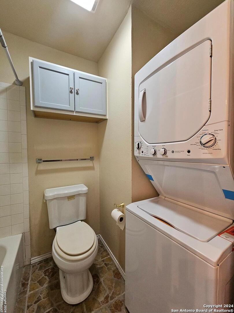 4803 Hamilton Wolfe Road, Unit 312 San Antonio, TX 78229 - Photo 4 of 13 a close view of a washer and dryer