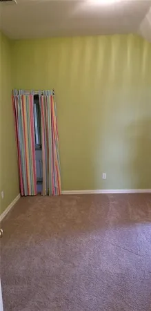 a view of a room with clothes and shoes