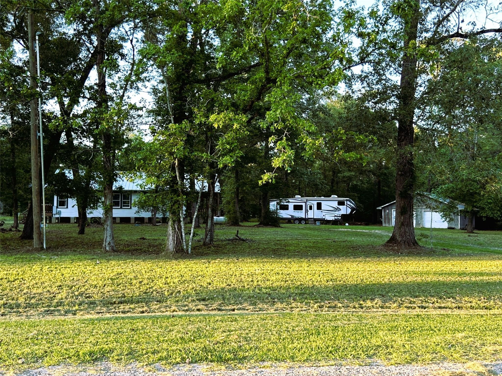 877 County Road 6474 Dayton, TX 77535 - Photo 12 of 27 a garden view