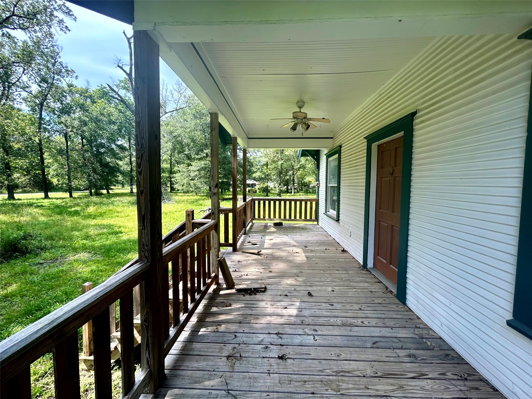 877 County Road 6474 Dayton, TX 77535 - Photo 14 of 27 a view of porch with wooden floor