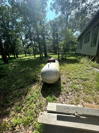 a view of a backyard of a house