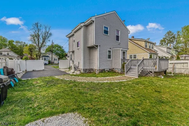 a view of a back yard of the house