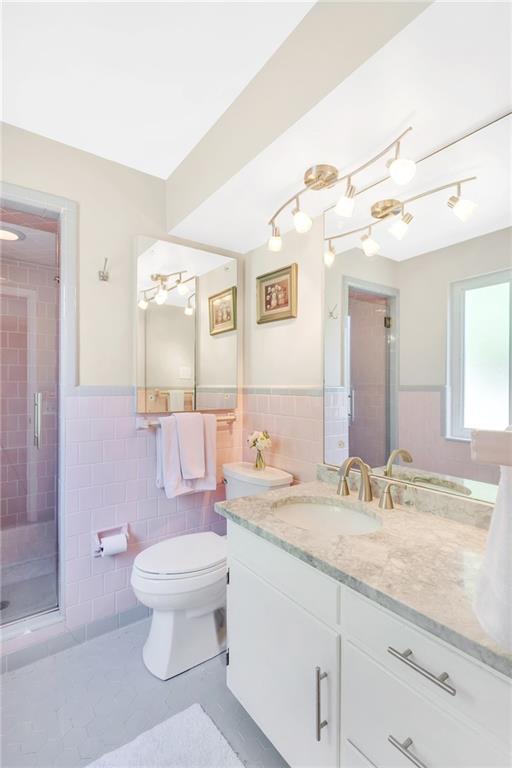 69 Holland Road Pittsburgh, PA 15235 - Photo 16 of 25 The master bath has new lighting, countertop, under mounted sink, faucet assemble, vanity hardware, shower door & shower head and commode. Yes all of those are NEW!