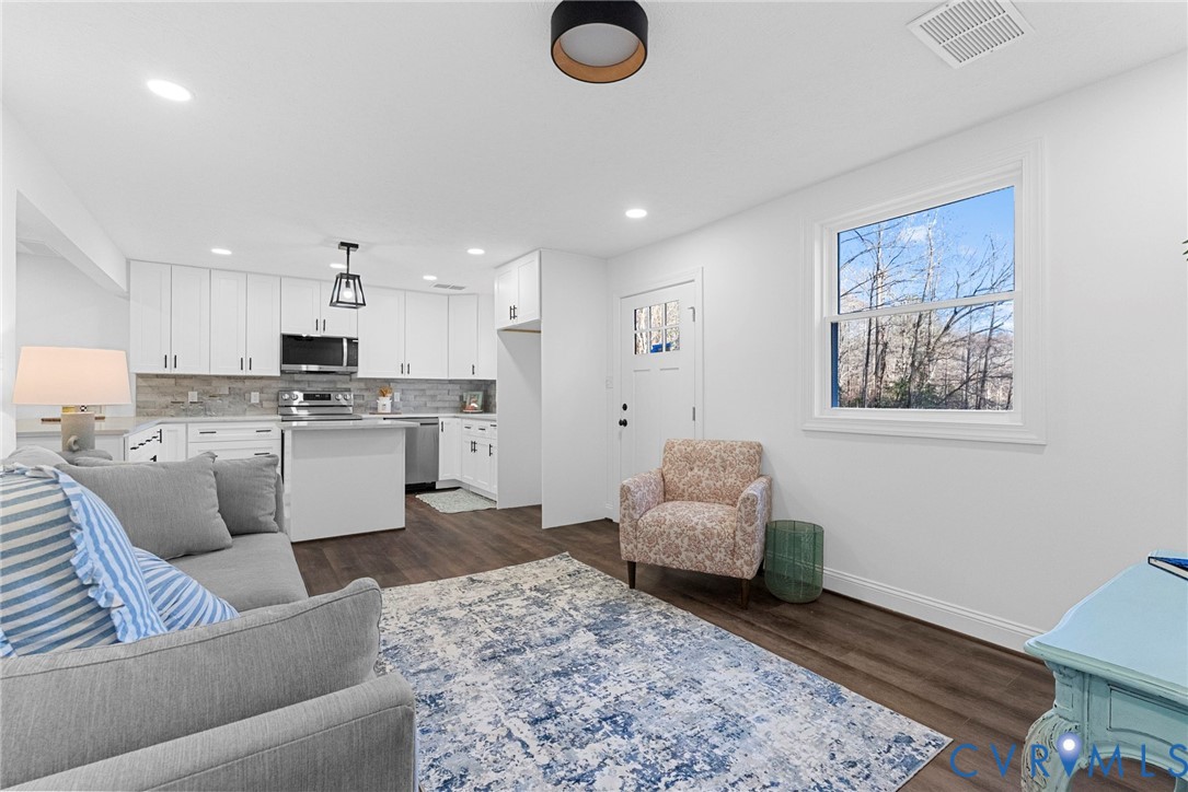 6329 Orchard Road New Kent, VA 23124 - Photo 11 of 25 a living room with furniture and kitchen view