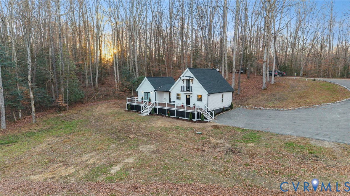 6329 Orchard Road New Kent, VA 23124 - Photo 7 of 25 a view of a house with backyard and garden
