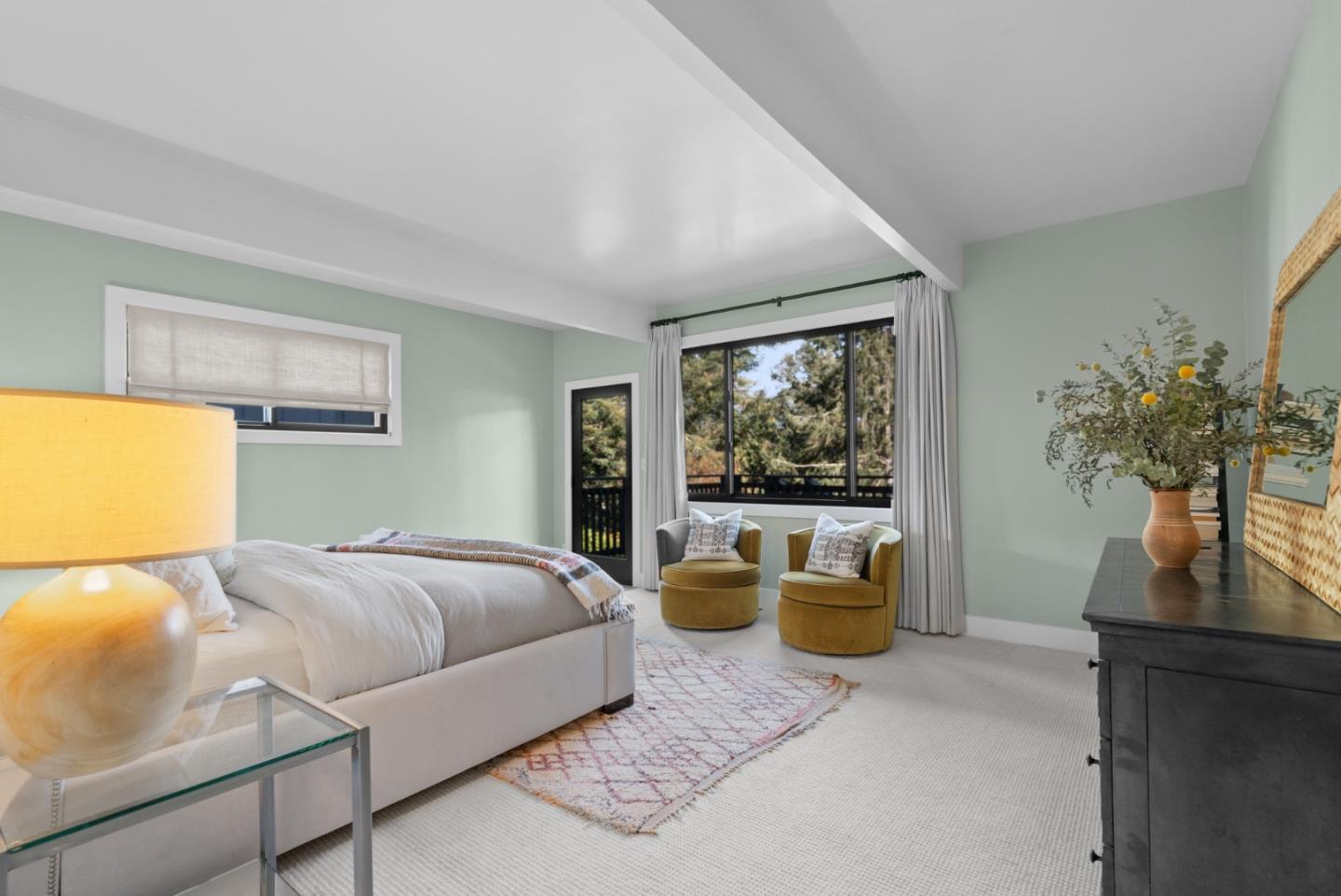 409 Townsend Drive Aptos, CA 95003 - Photo 28 of 43 a bedroom with a large bed and a potted plant