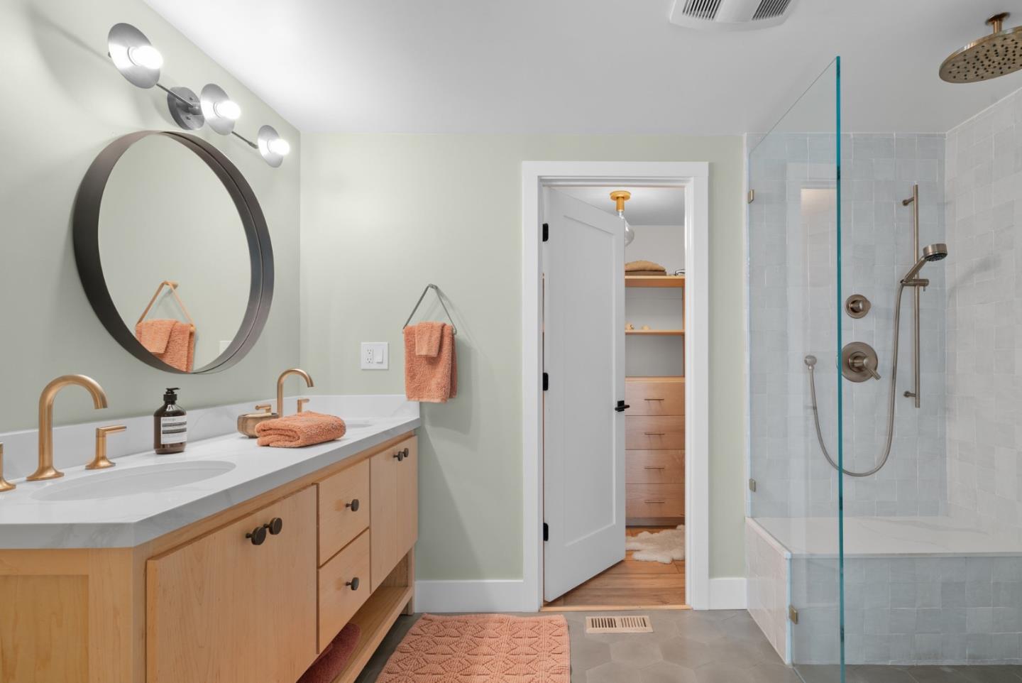 409 Townsend Drive Aptos, CA 95003 - Photo 31 of 43 a bathroom with a double vanity sink mirror and shower