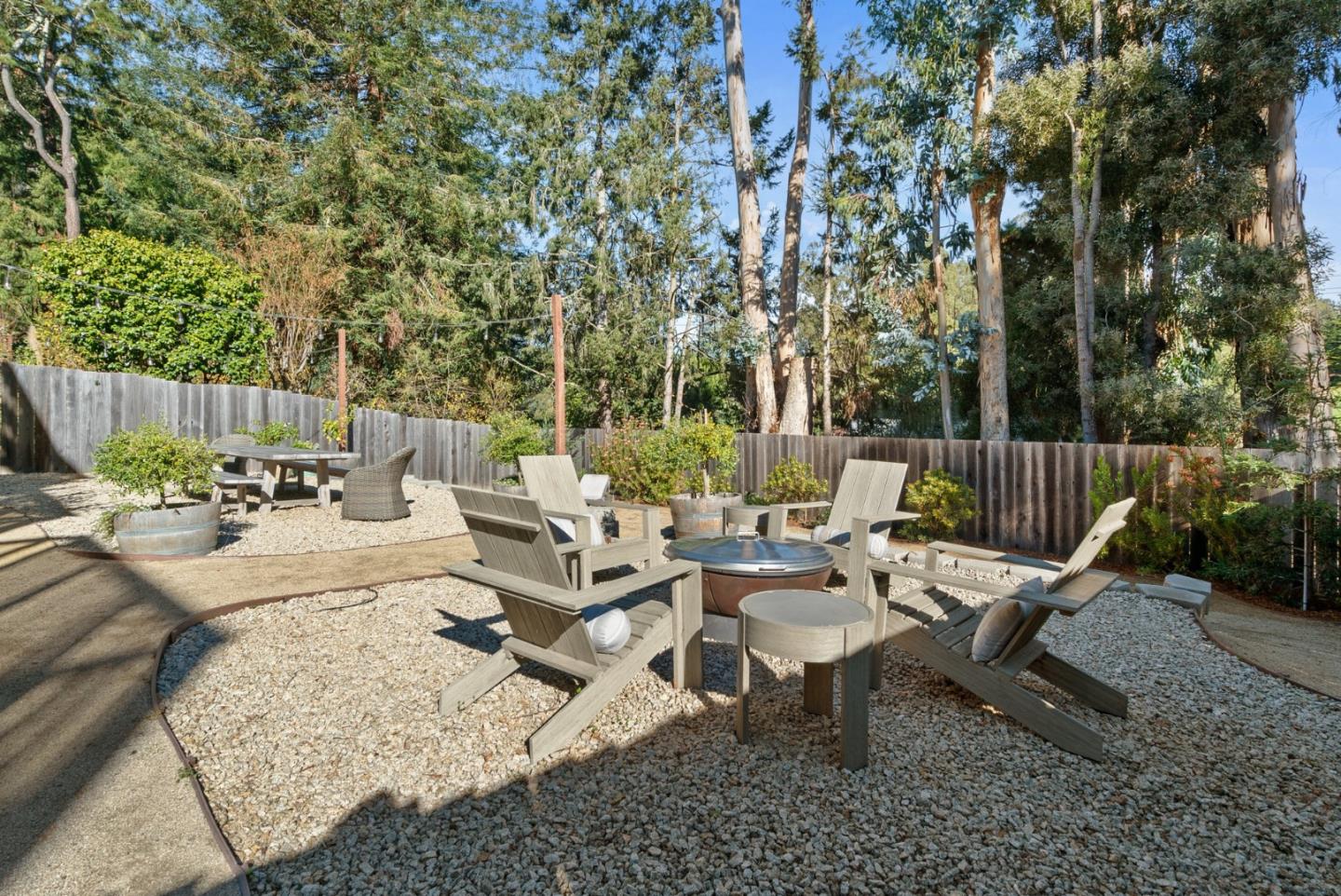 409 Townsend Drive Aptos, CA 95003 - Photo 41 of 43 a view of a backyard with chairs and a patio