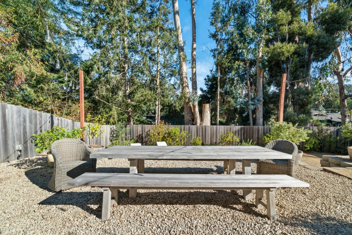 409 Townsend Drive Aptos, CA 95003 - Photo 42 of 43 a view of a patio with couches table and chairs and potted plants