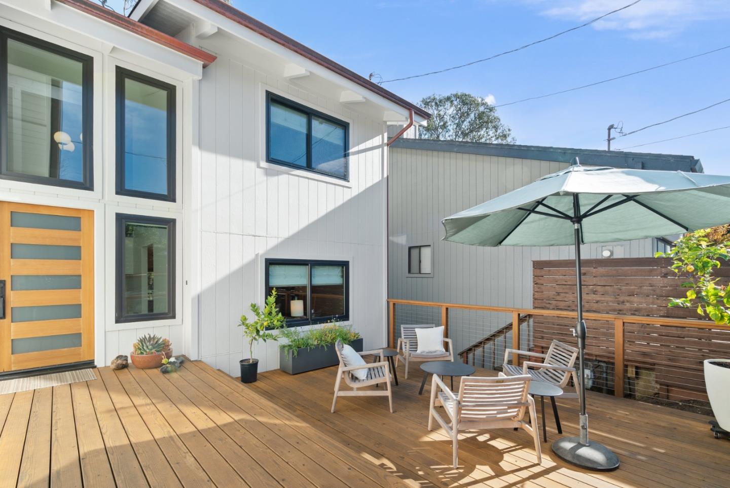 409 Townsend Drive Aptos, CA 95003 - Photo 5 of 43 a patio with a patio table and chairs
