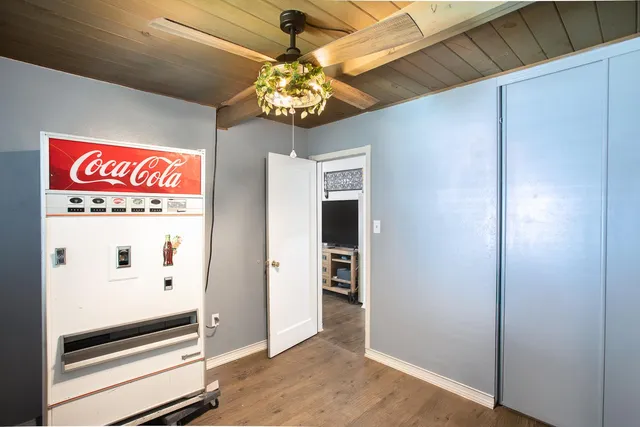 a view of a hallway with a chandelier