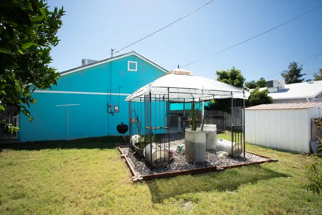 a view of a swimming pool with a patio