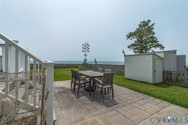 a outdoor dining space with furniture and garden