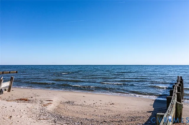 a view of wooden floor and a lake