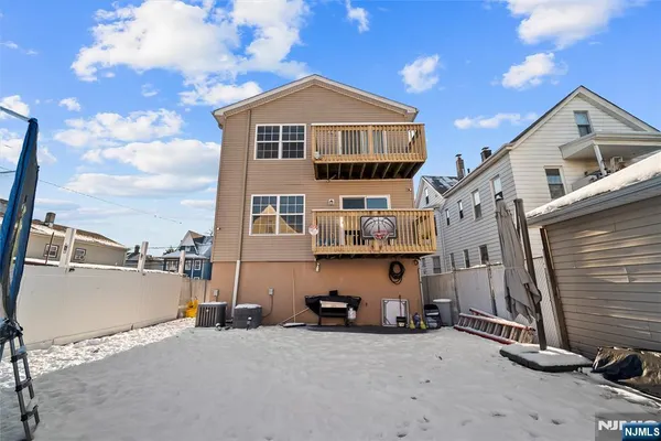 a view of a car park in front of house