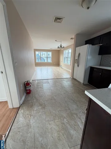 a view of a livingroom with furniture and window