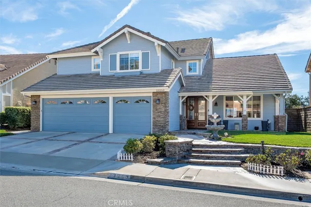 an aerial view of a house with a garden