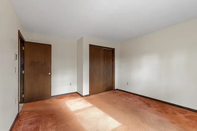a living room with a fireplace