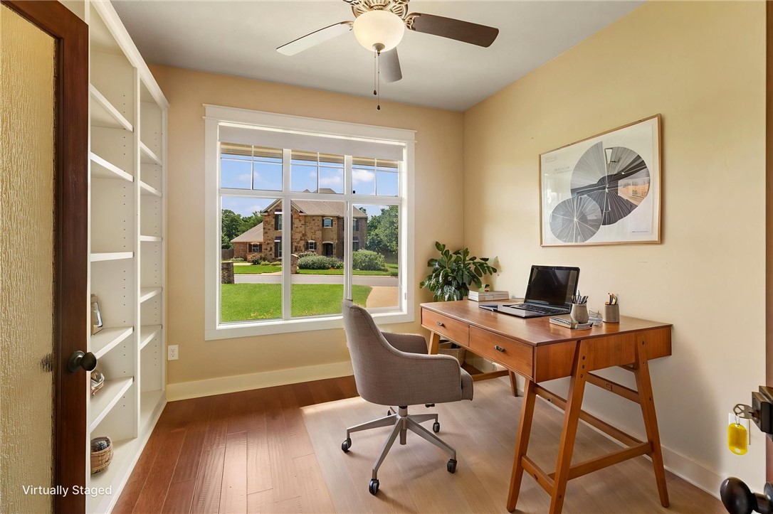 2136 Rockcliffe Loop College Station, TX 77845 - Photo 11 of 48 a view of a workspace with furniture and a window