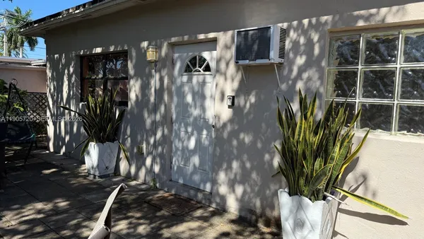 a view of a potted plants next to a building