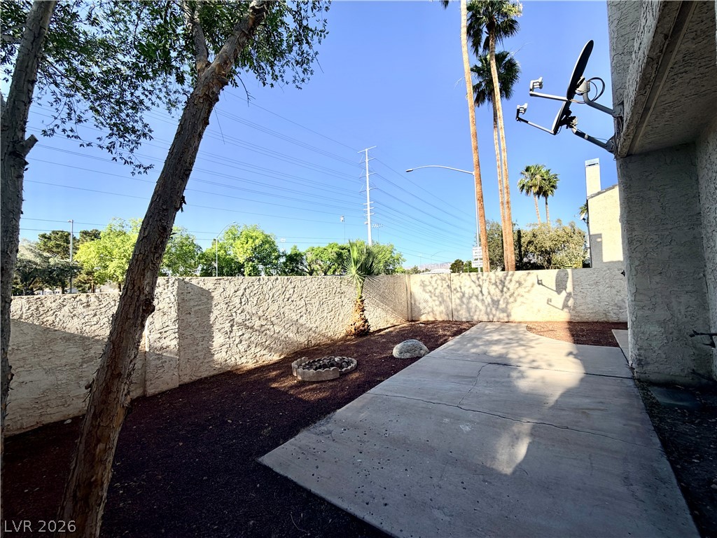 6250 West Flamingo Road, Unit 4 Las Vegas, NV 89103 - Photo 37 of 45 This spacious private yard offers a tranquil retreat for outdoor living and entertaining.