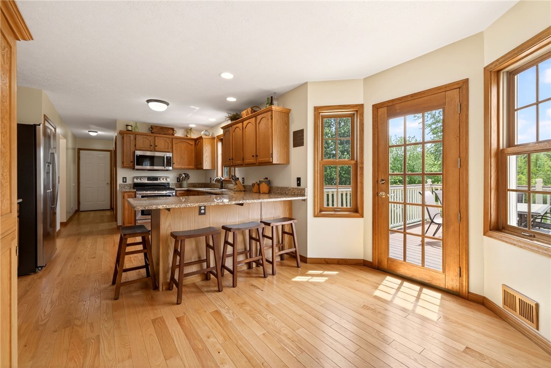 3249 Big Ridge Road Ogden, NY 14559 - Photo 19 of 50 Dinette to kitchen & deck