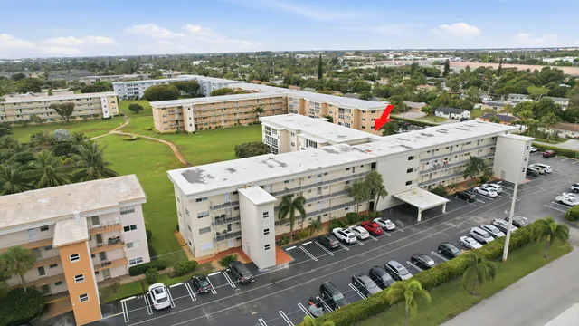 an aerial view of a house with a garden