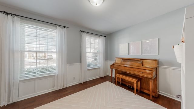 a room with furniture and a window