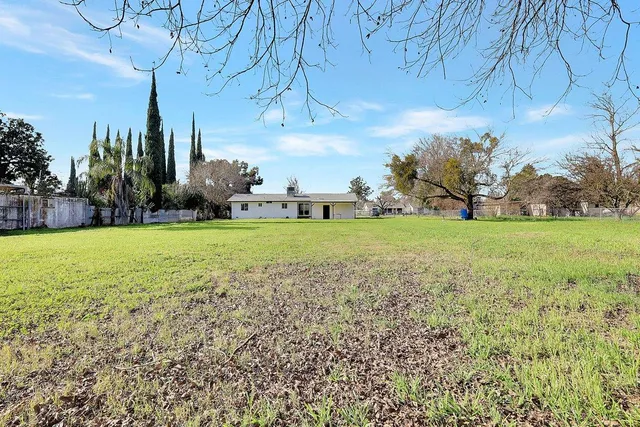 a view of a garden with an outdoor space