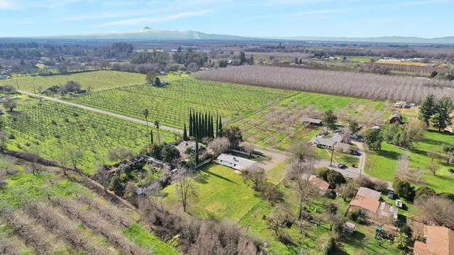 a view of a yard and deck
