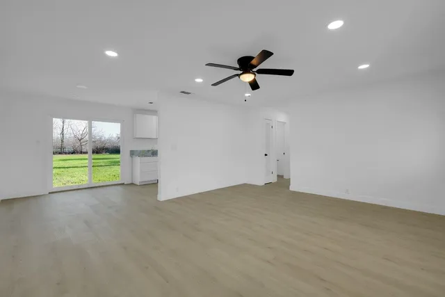 a view of a room with a sink and a window
