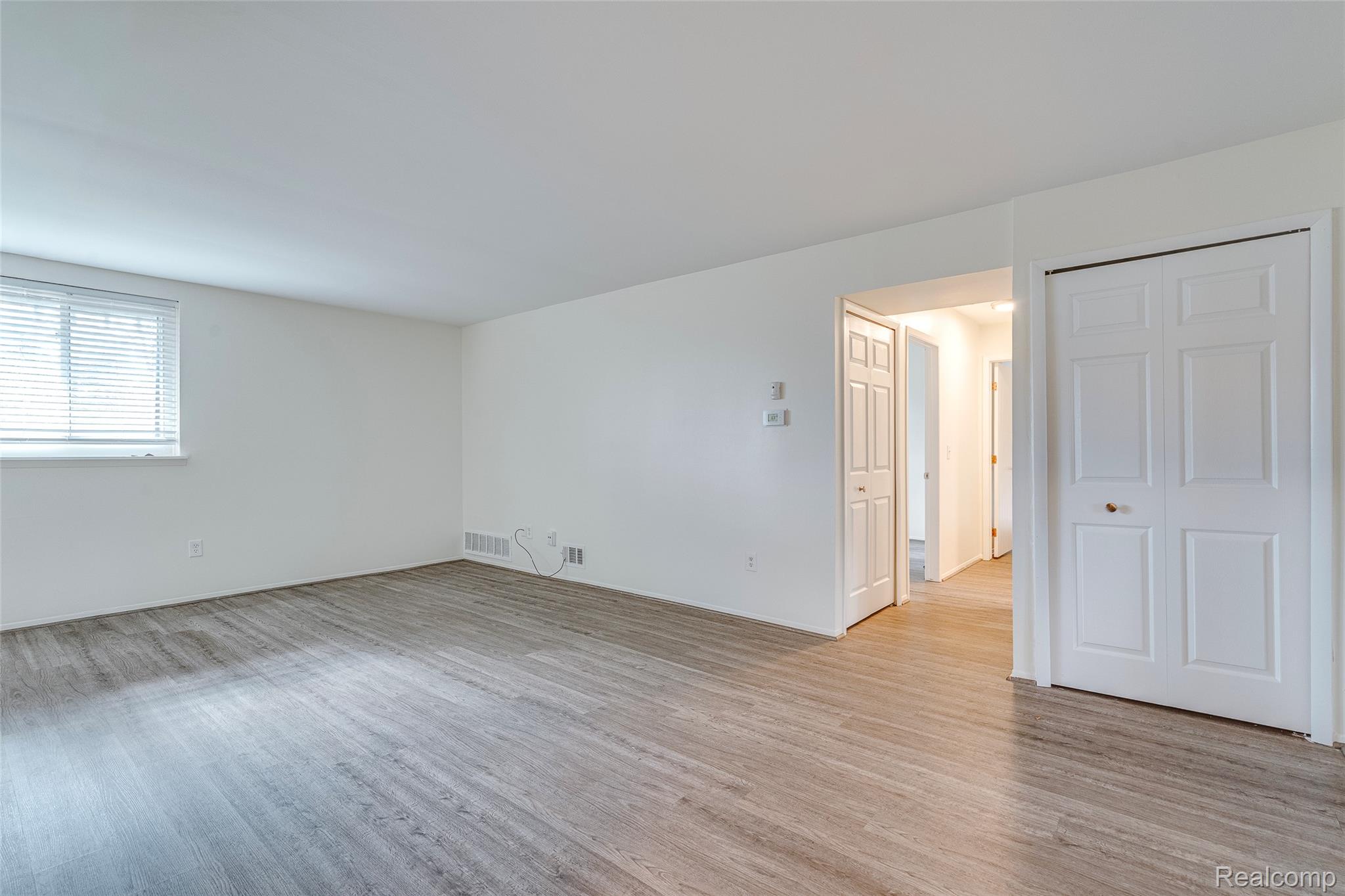 29860 West 12 Mile Road, Unit 604 Farmington, MI 48334 - Photo 11 of 26 Empty room with light wood finished floors
