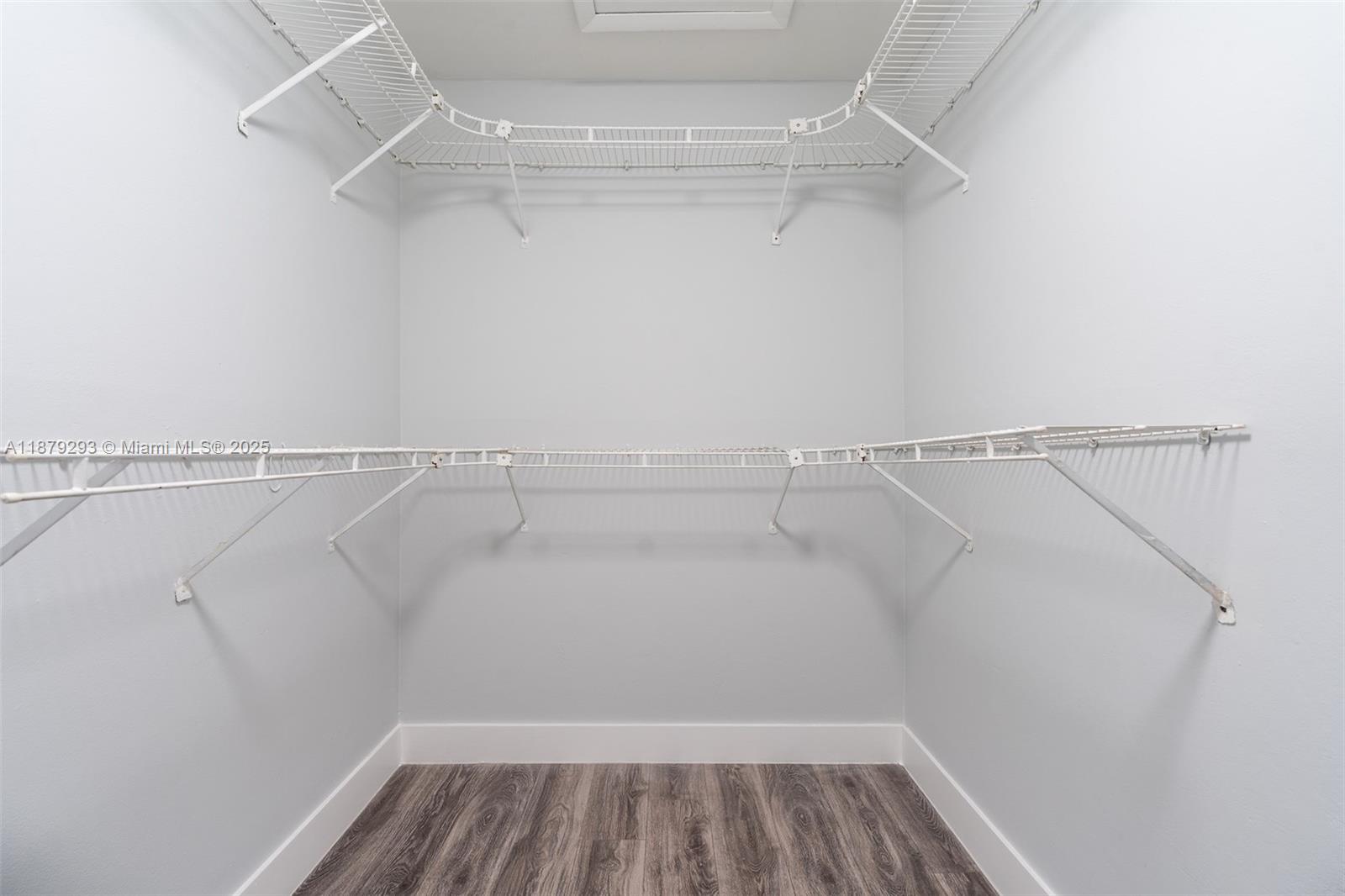 6211 Southwest 116th Place, Unit C22 Miami, FL 33173 - Photo 16 of 33 a view of a room with racks on the wall