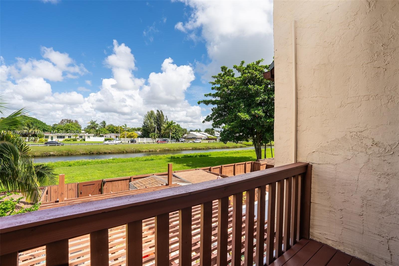 6211 Southwest 116th Place, Unit C22 Miami, FL 33173 - Photo 21 of 33 a view of swimming pool from a balcony