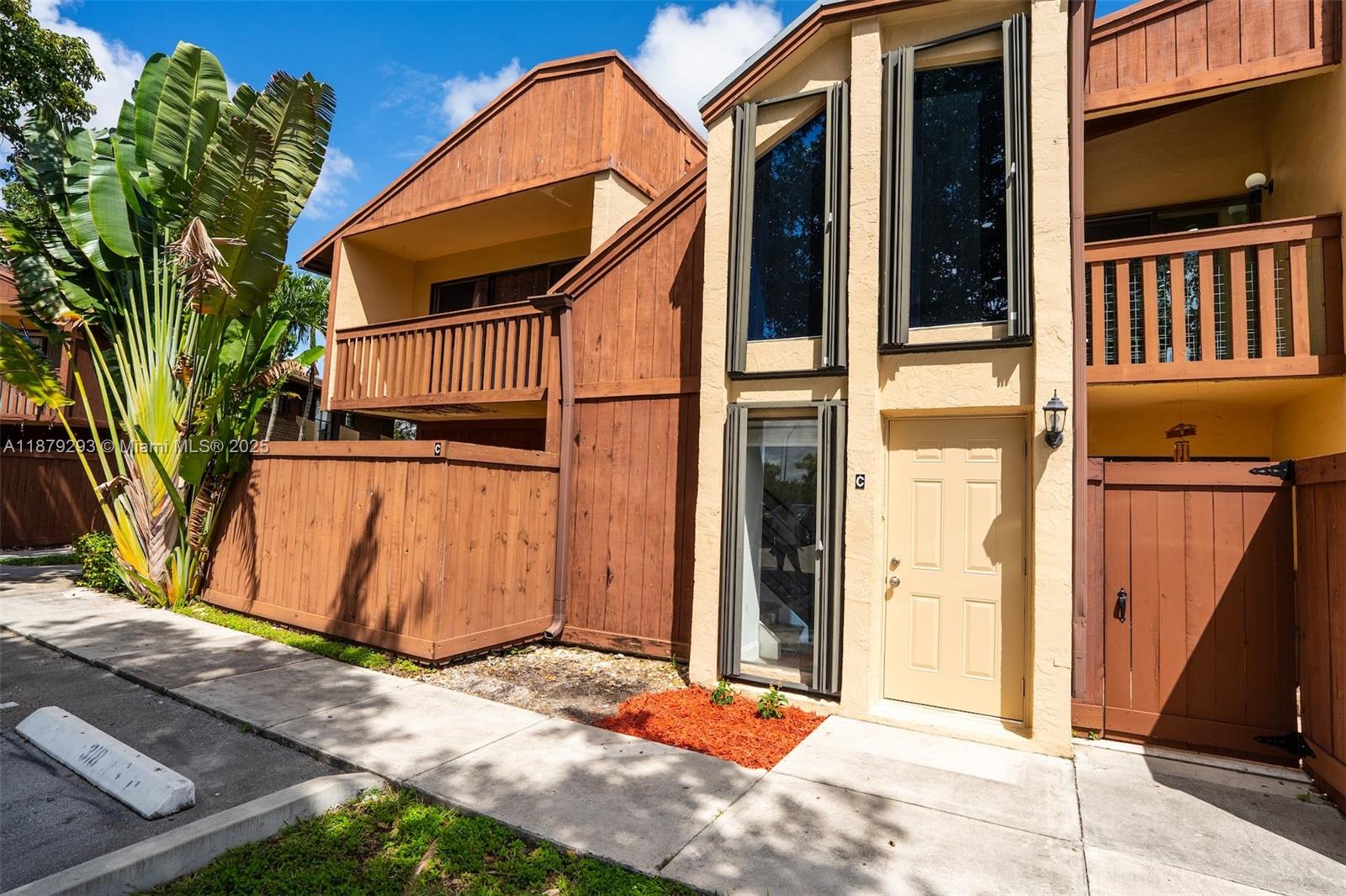 6211 Southwest 116th Place, Unit C22 Miami, FL 33173 - Photo 28 of 33 a view of a house with street