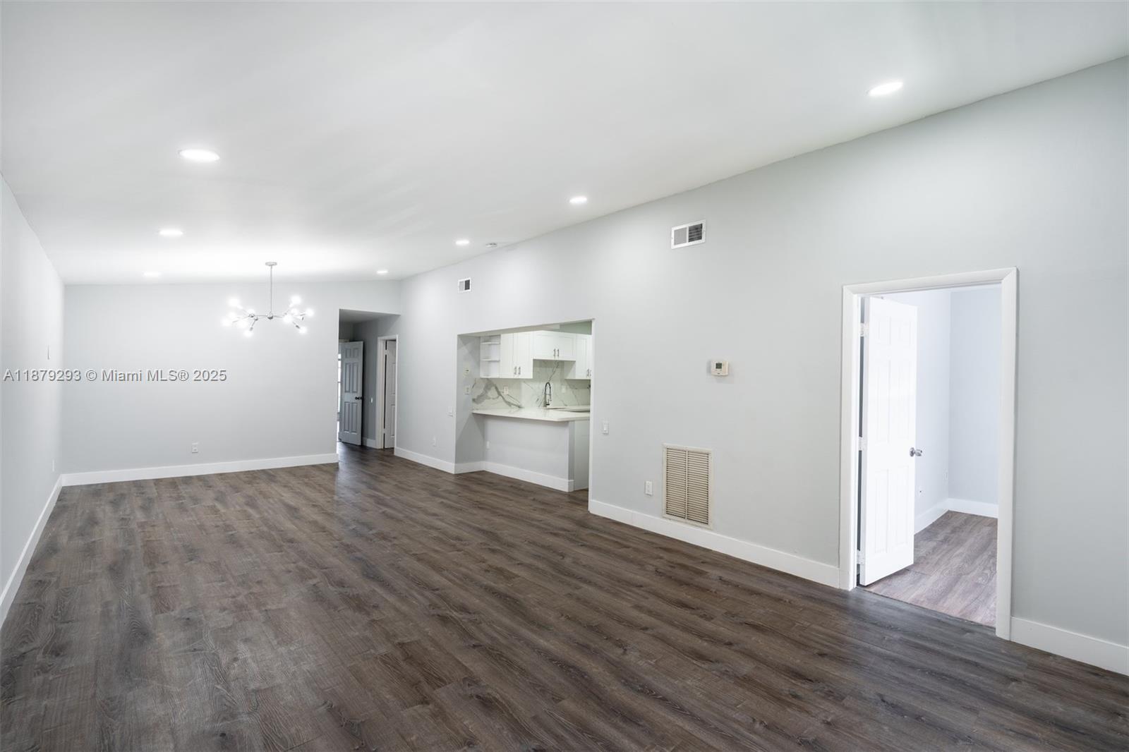 6211 Southwest 116th Place, Unit C22 Miami, FL 33173 - Photo 8 of 33 a view of kitchen with wooden floor