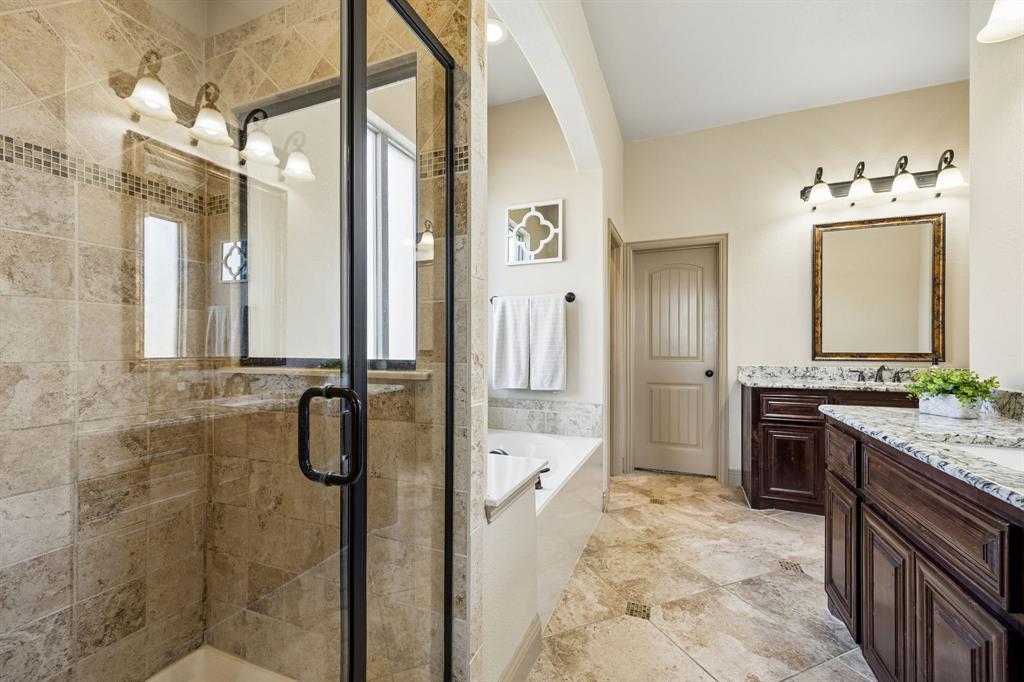 1341 Canary Lane Forney, TX 75126 - Photo 15 of 34 Primary bathroom with large walk in closet.