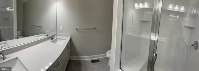 a bathroom with a sink and toilet