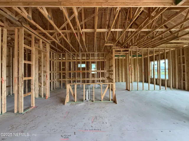 a view of a room with wooden walls