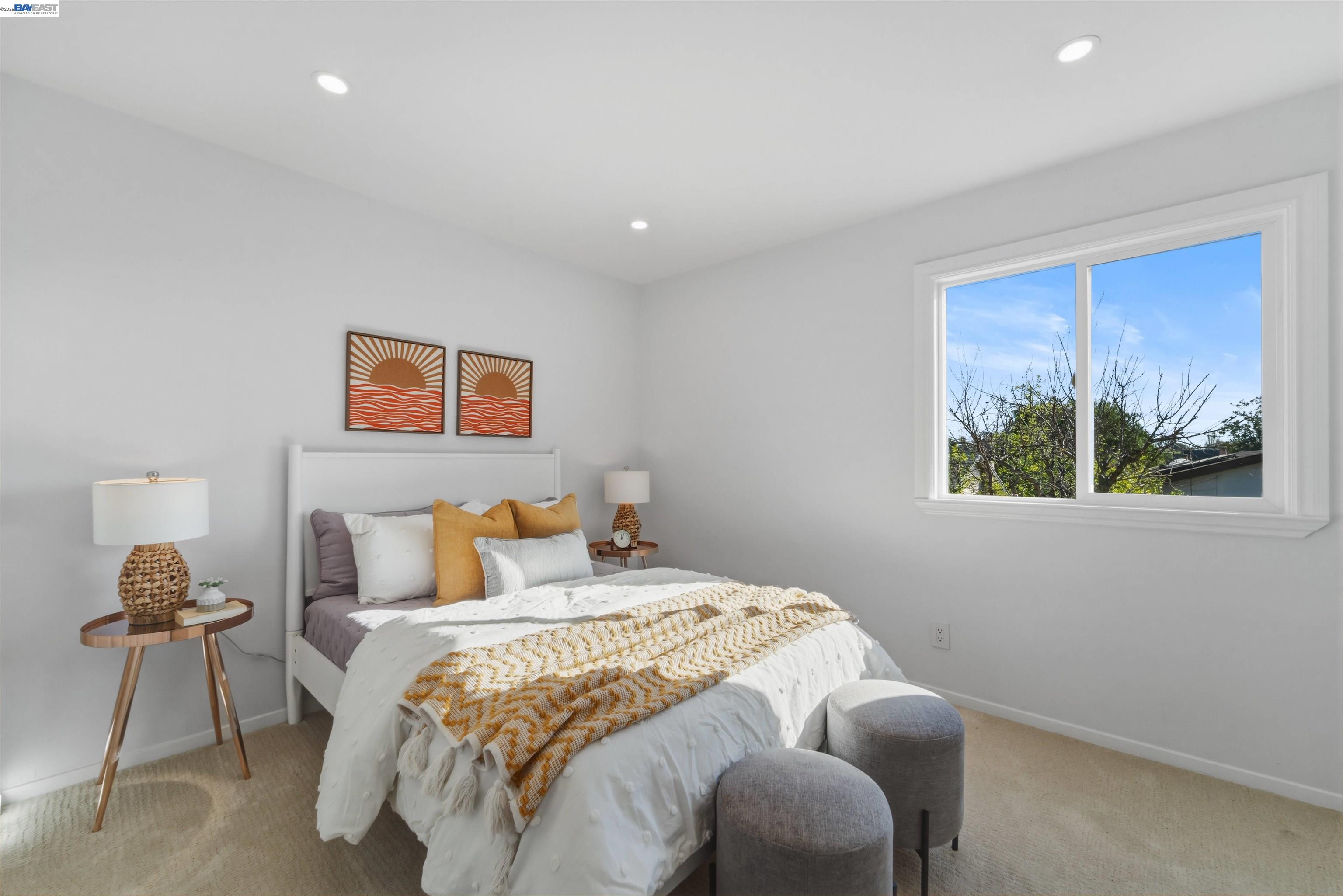 32471 Lake Ree Street Fremont, CA 94555 - Photo 14 of 31 a bedroom with a bed and a painting on the wall