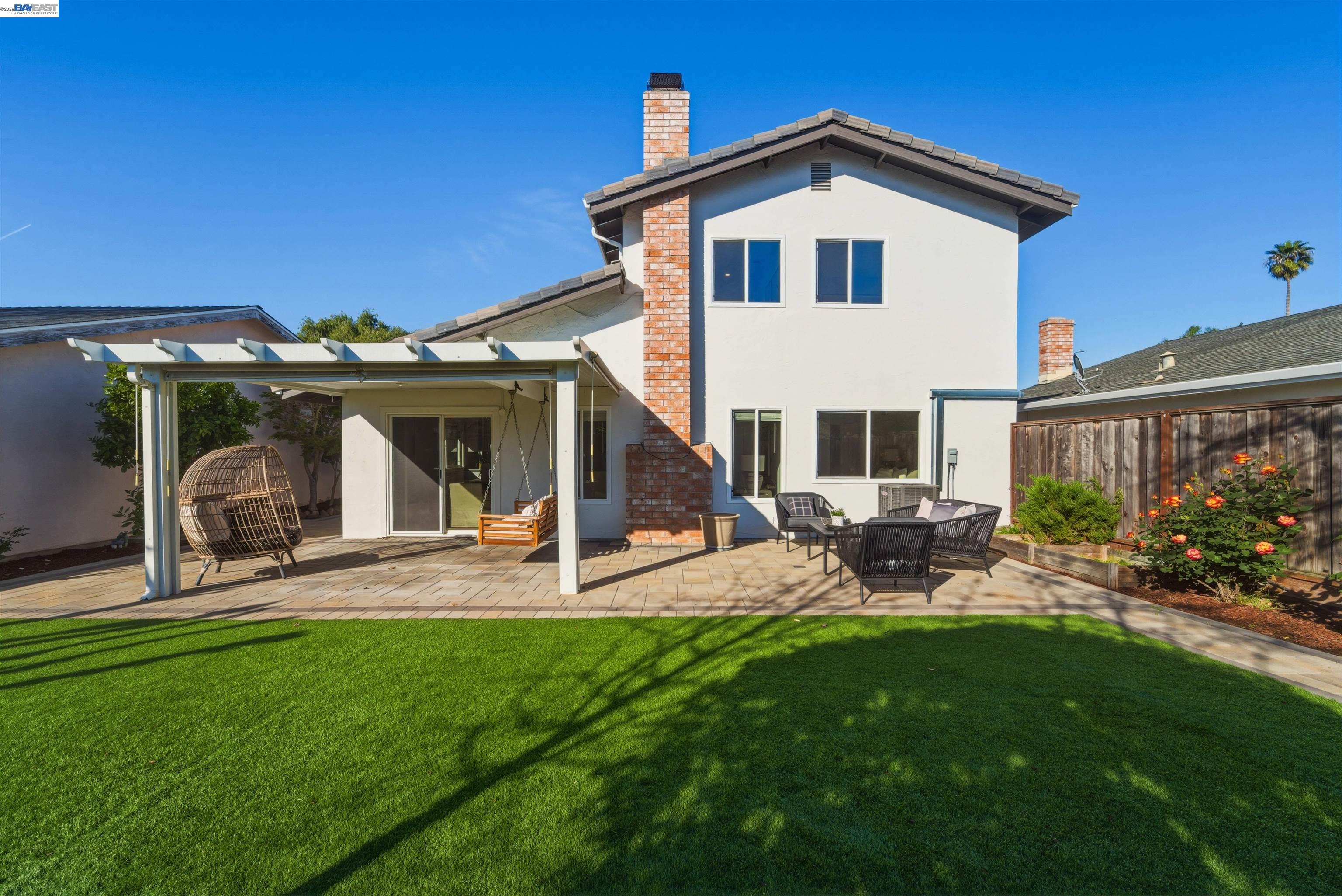 32471 Lake Ree Street Fremont, CA 94555 - Photo 19 of 31 a view of a house with a yard and sitting area