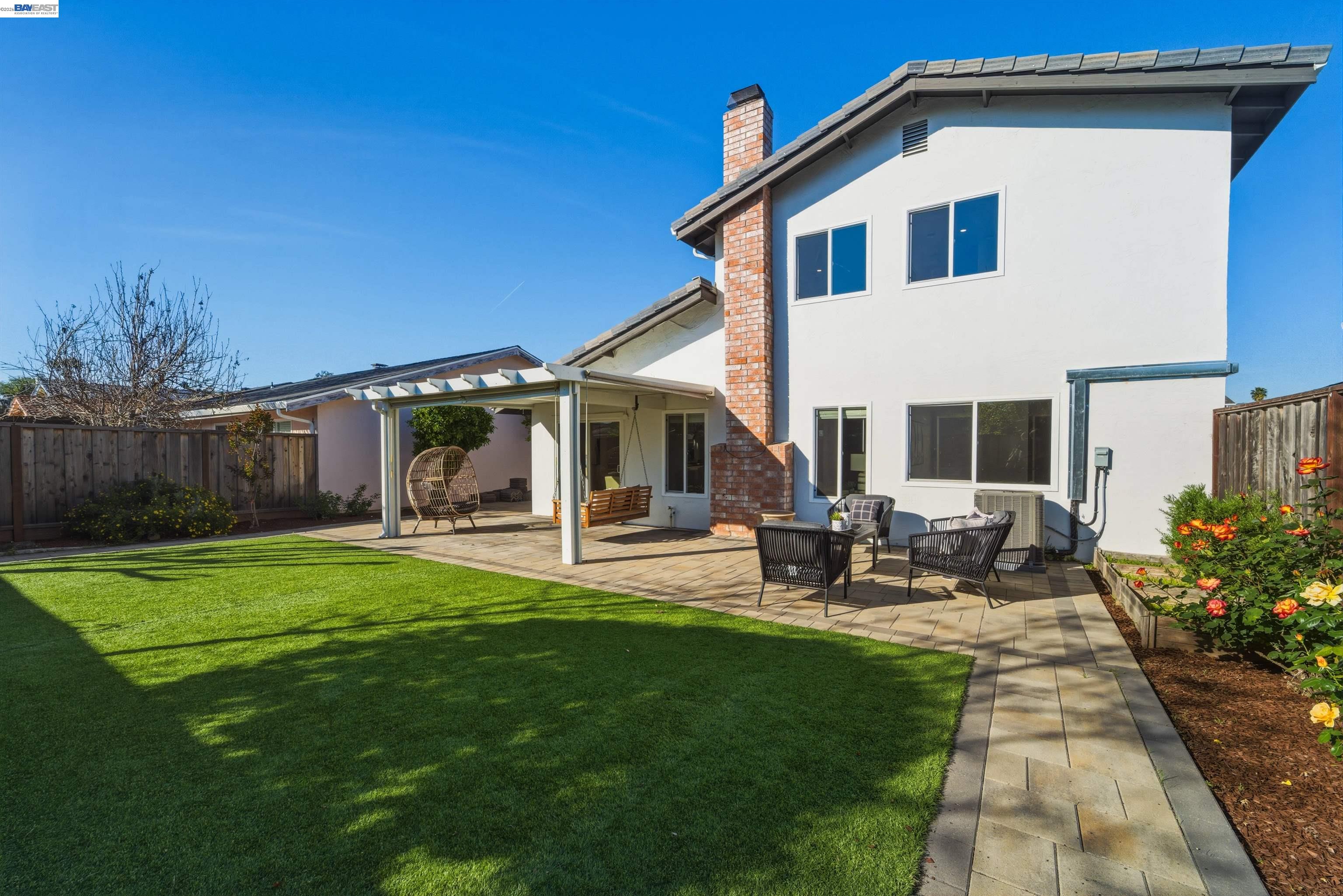 32471 Lake Ree Street Fremont, CA 94555 - Photo 20 of 31 a view of a house with backyard sitting area and garden