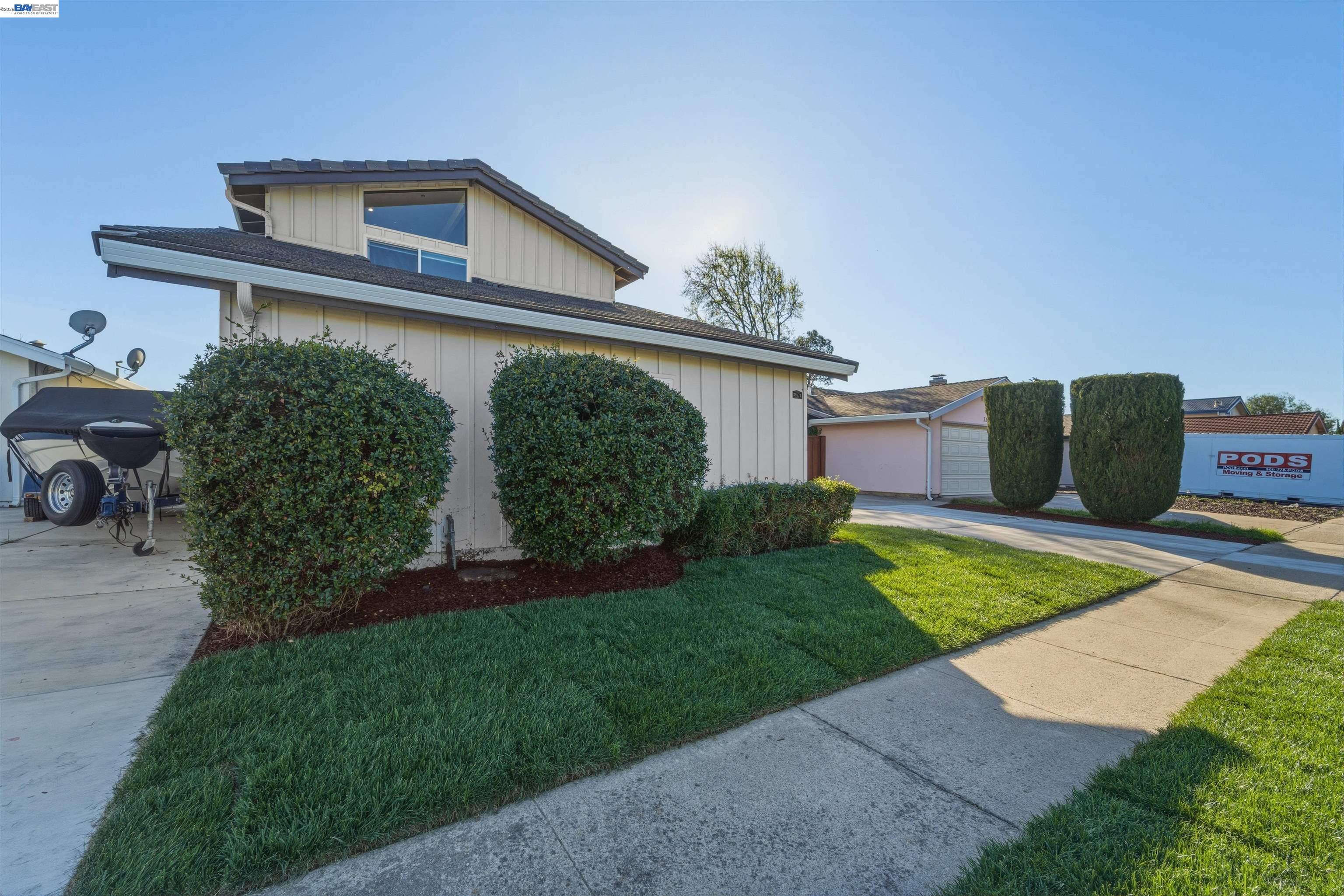 32471 Lake Ree Street Fremont, CA 94555 - Photo 23 of 31 a front view of a house with garden