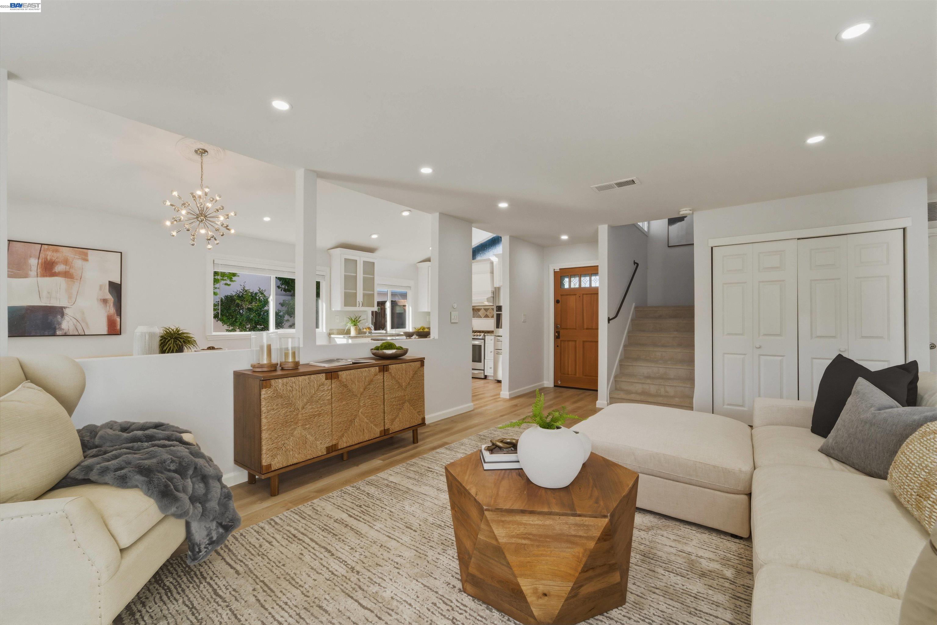 32471 Lake Ree Street Fremont, CA 94555 - Photo 4 of 31 a living room with furniture and a large window