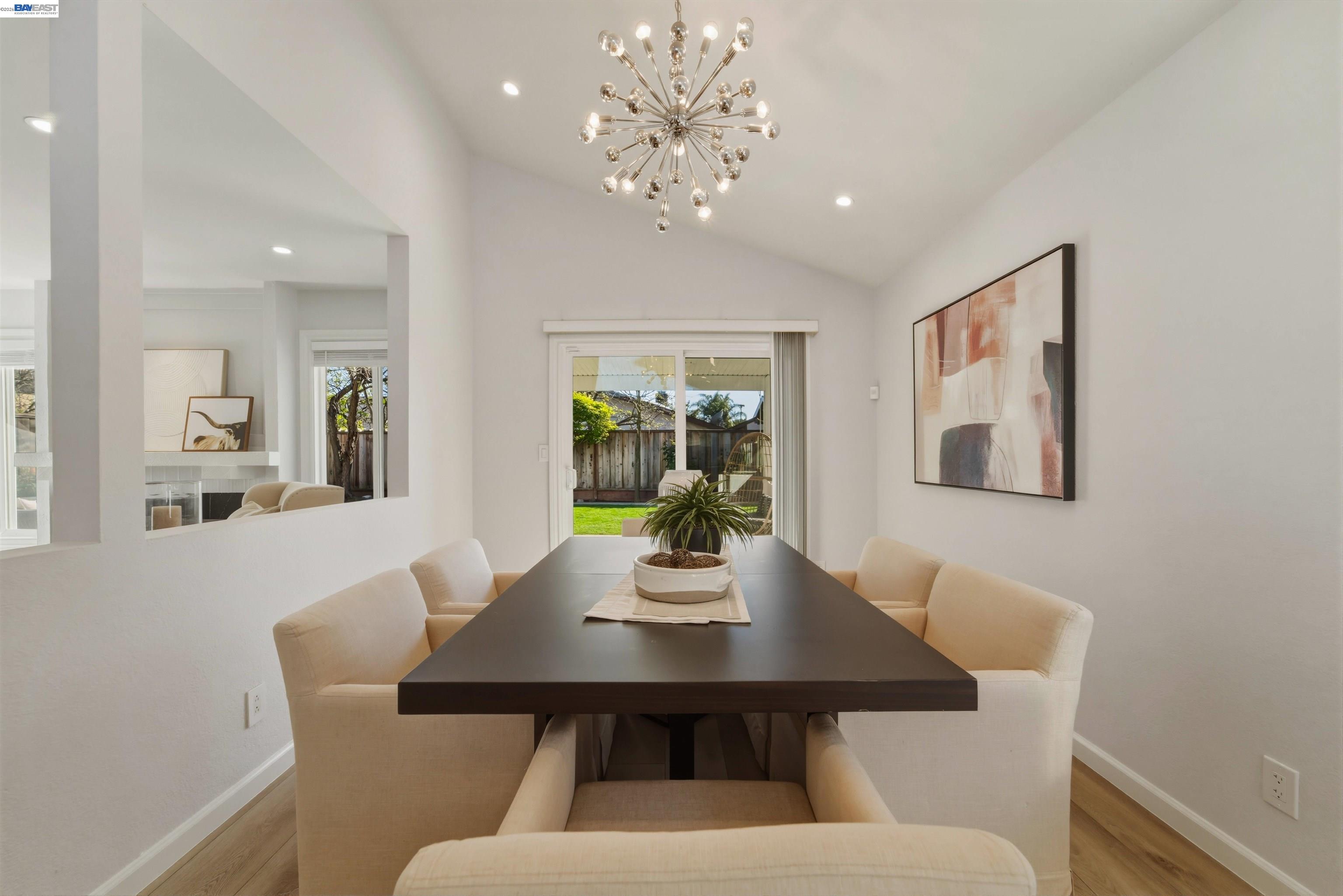 32471 Lake Ree Street Fremont, CA 94555 - Photo 7 of 31 a view of a dining room with furniture and chandelier