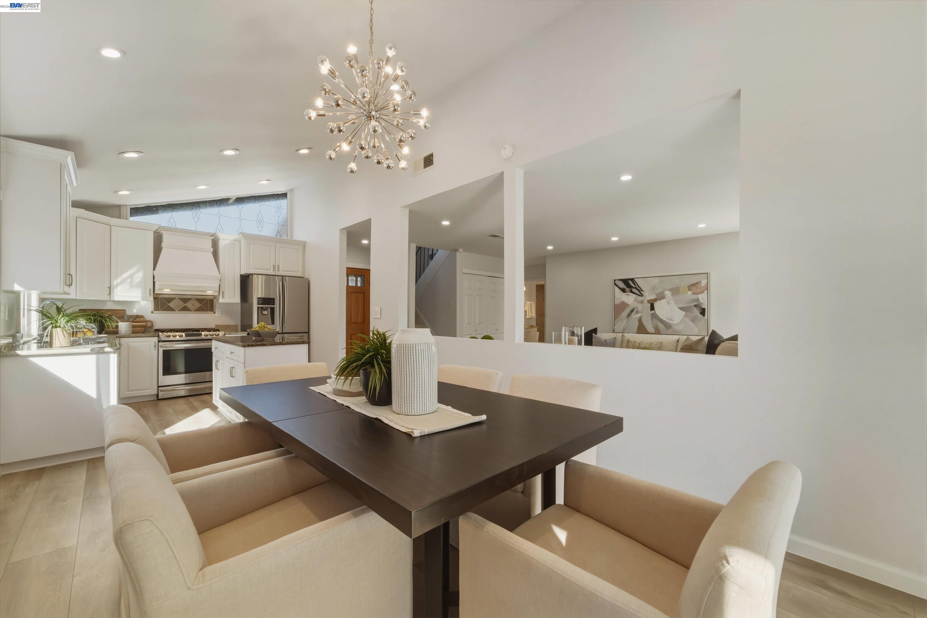32471 Lake Ree Street Fremont, CA 94555 - Photo 8 of 31 a view of a dining room with furniture and wooden floor