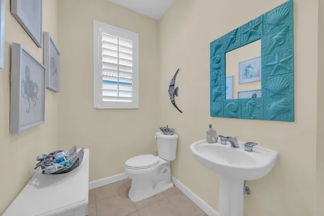 a bathroom with a sink and a washing machine