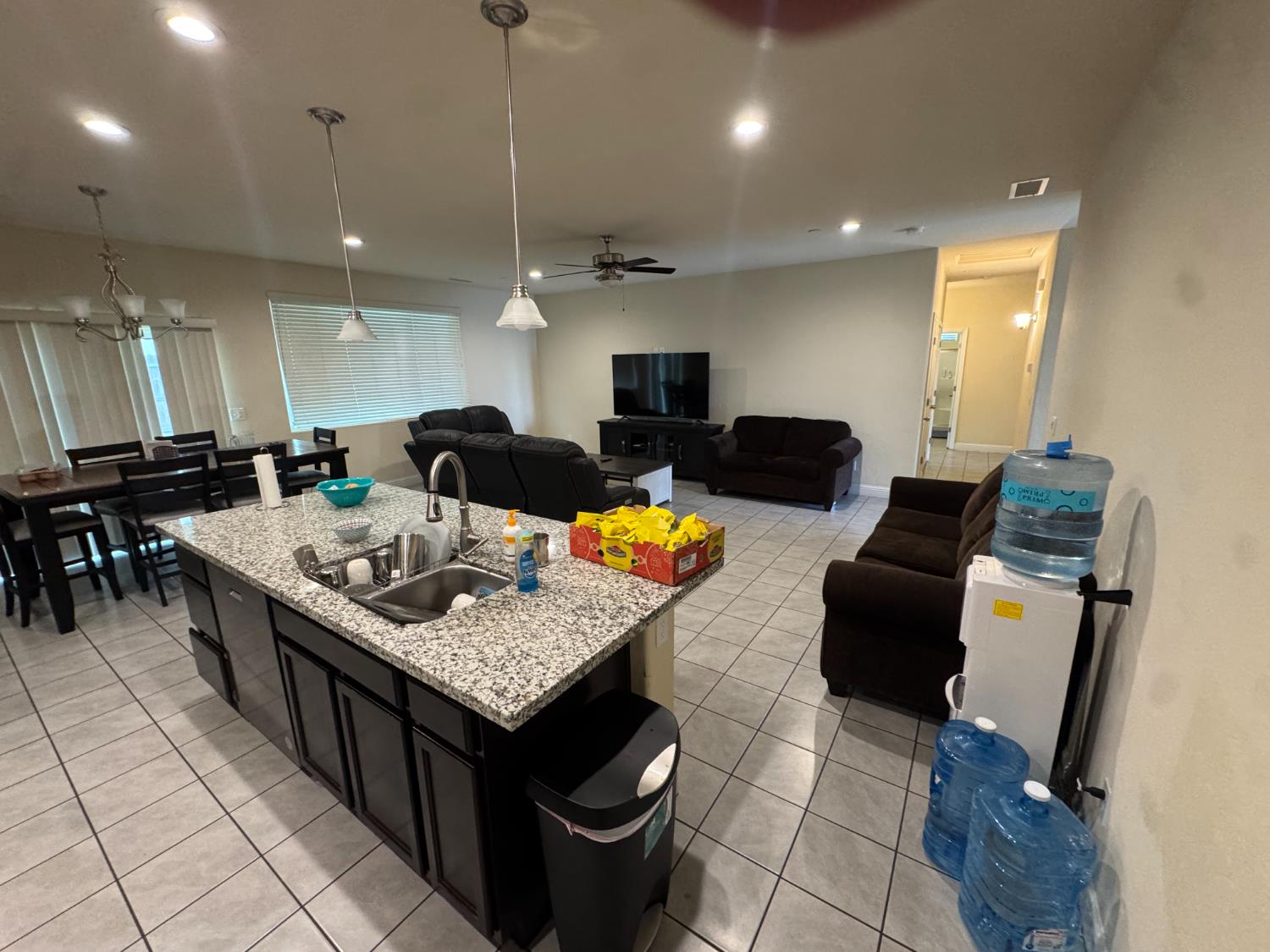 1726 Cleveland Street Selma, CA 93662 - Photo 1 of 17 a kitchen with a stove a counter top space and a sink